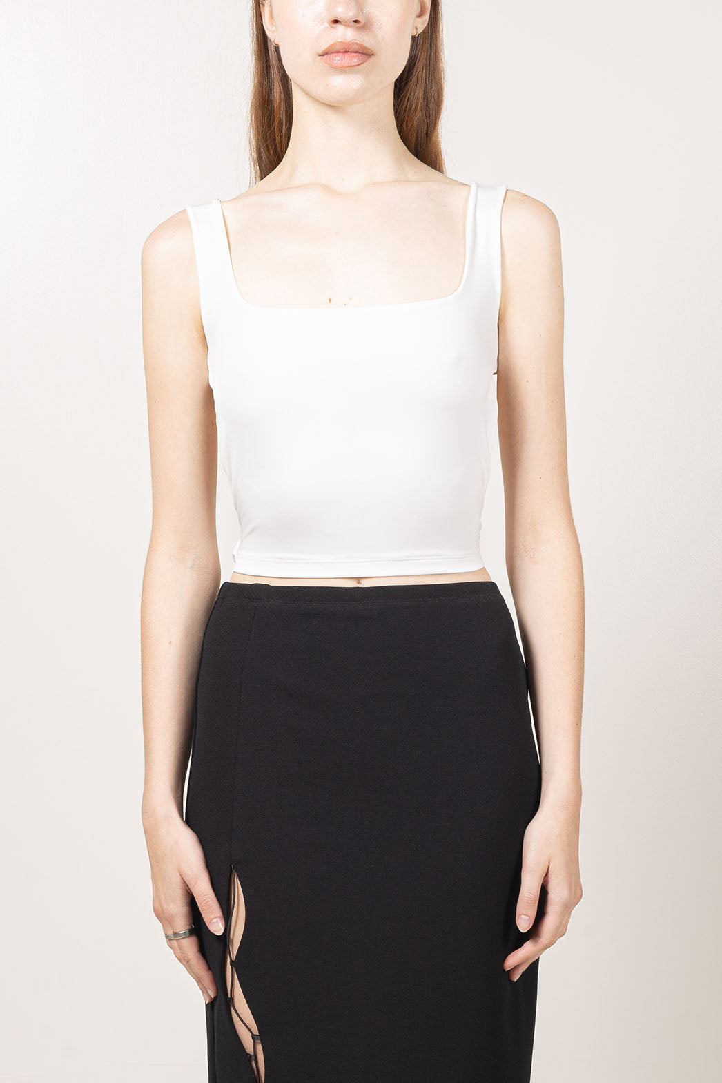 Tight fit open back top with and elastic band details at the back.