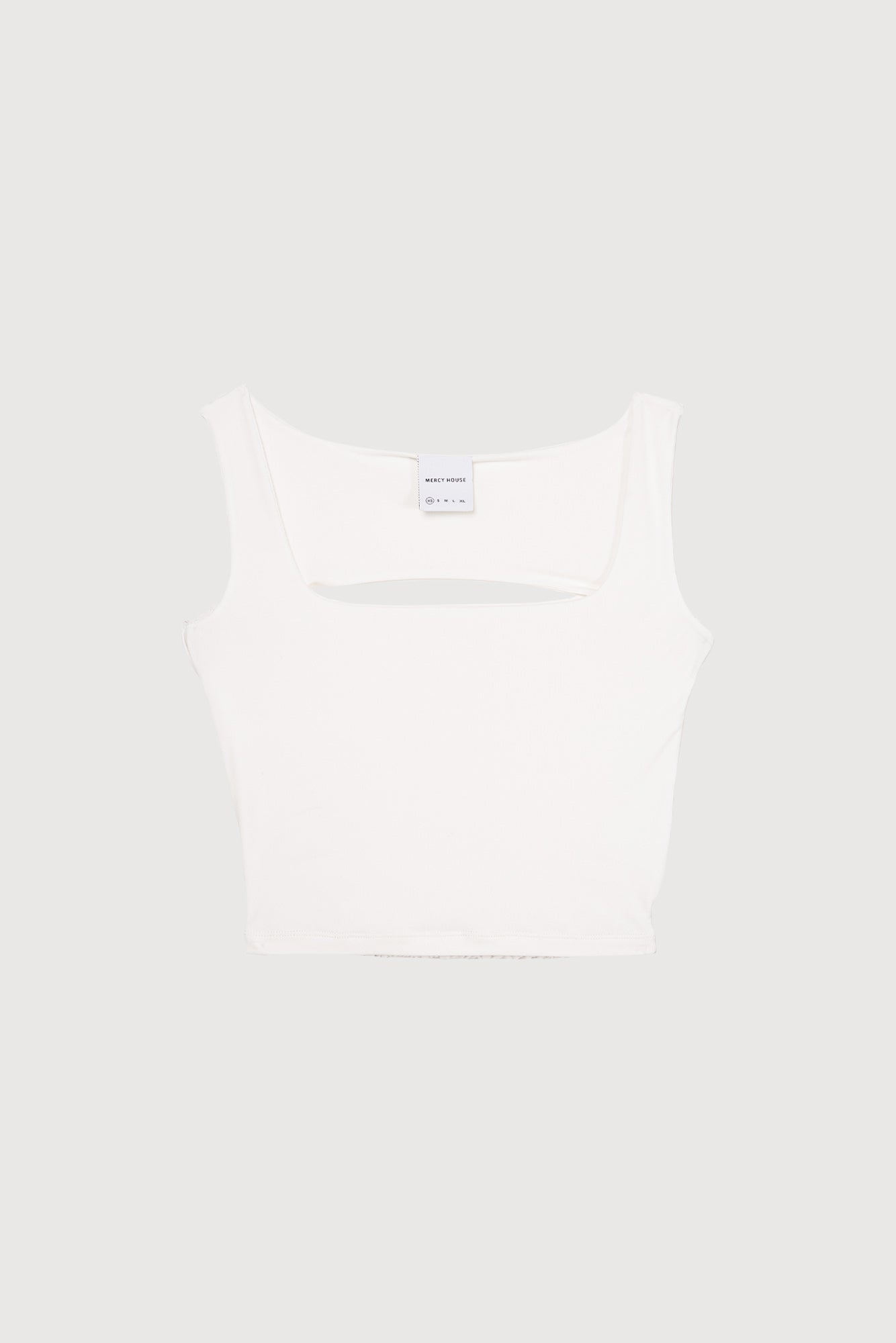 Tight fit open back top with and elastic band details at the back.